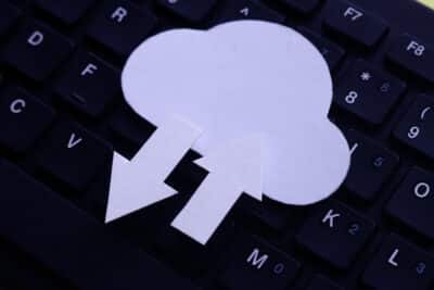 Off-Site and Cloud Backups - Icon depicting cloud storage on top of a keyboard